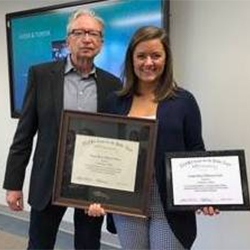O.C. Ferrell, Chapter Adviser, honors Catherine Miller with her award. O.C. Ferrell honors Catherine Miller with her award.