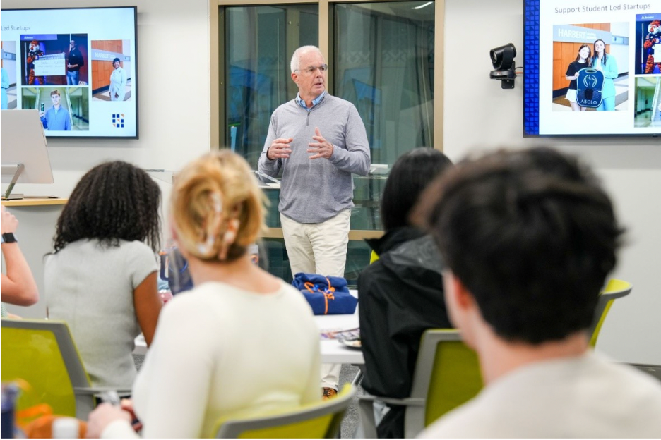 Ward Swift at NVA Man teaching in front of class