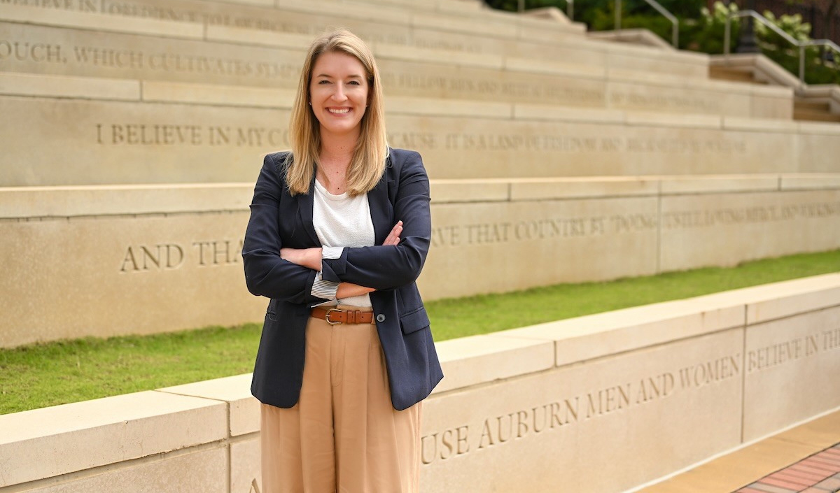 Woman standing by Creed steps