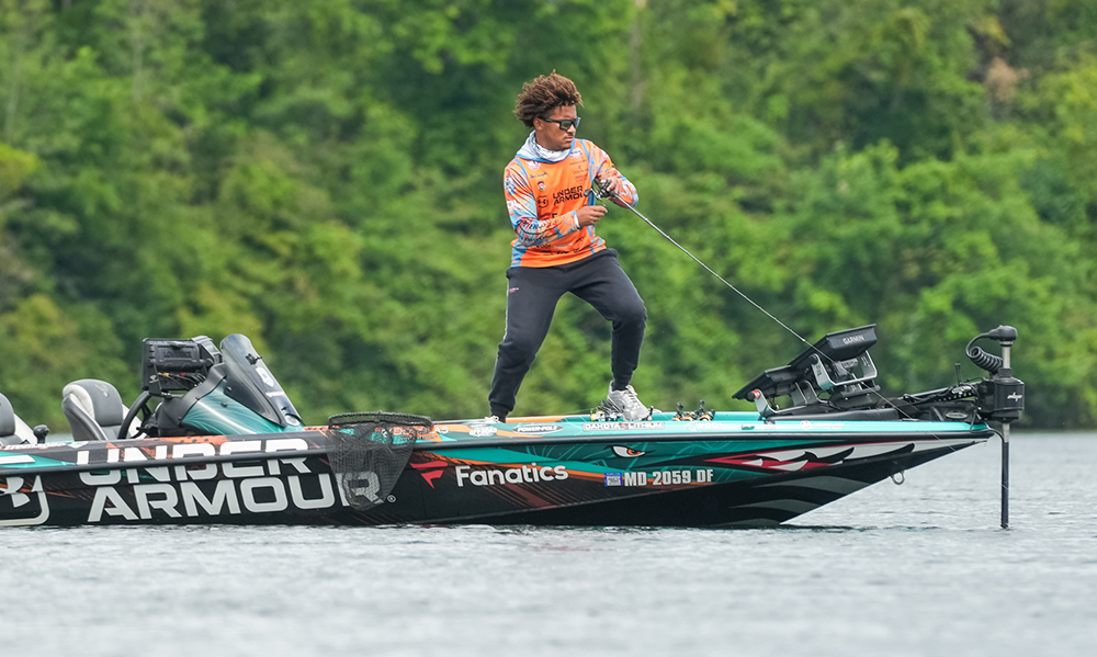 Reece Tremaglio undergrad spotlight Man fishing off a boat