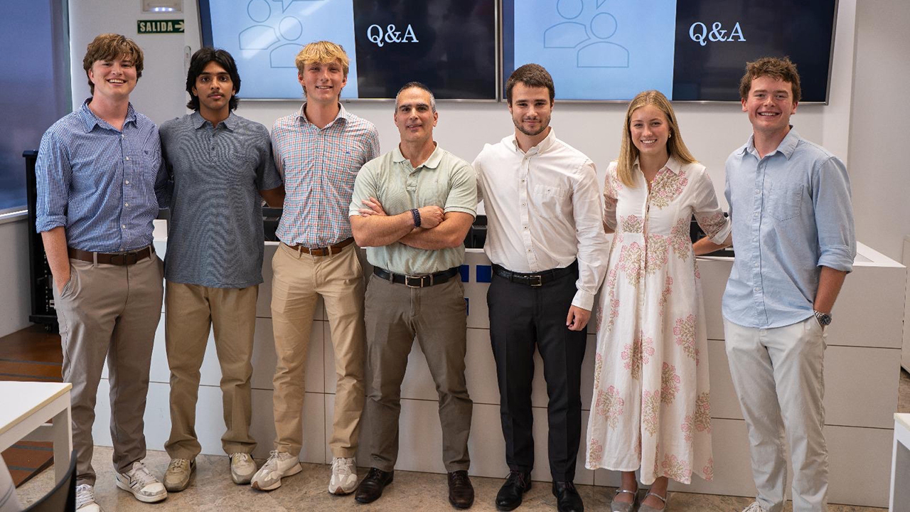 Student group standing in classroom