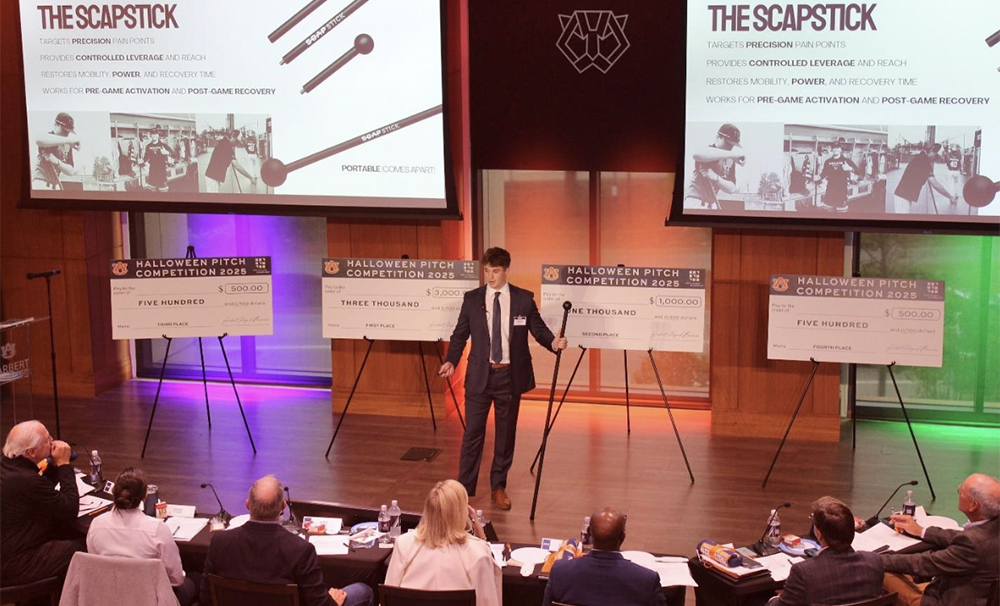 student presenting at pitch competition