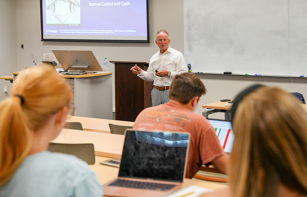 Man teaching in classroom