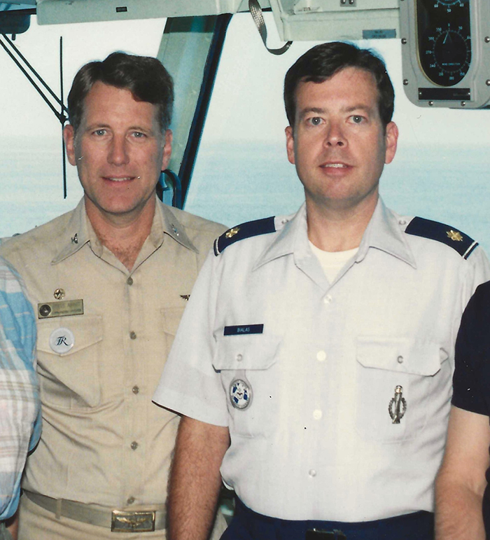 Admiral and air force officer standing