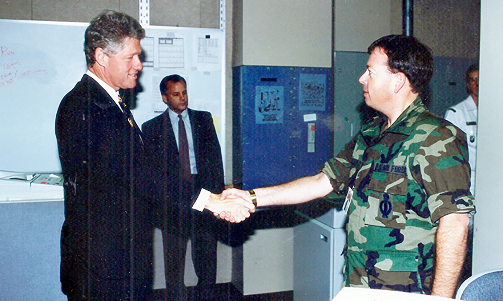 Bialas shake hands with Pres. Clinton