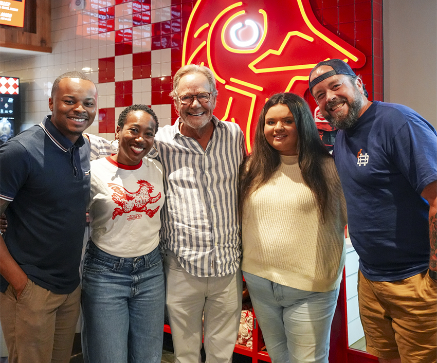 Five people standing together