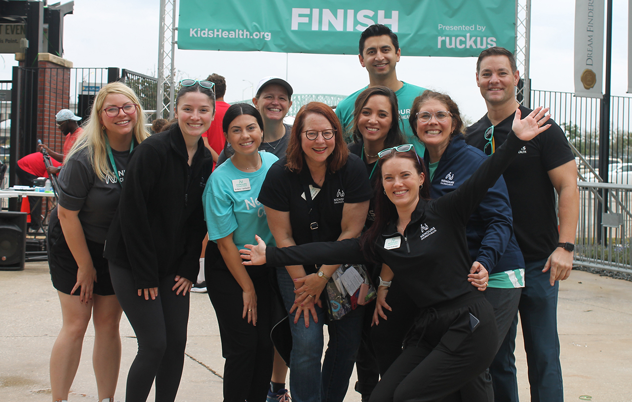 Brittany Upchurch and coworkers Group of people at finish line of race