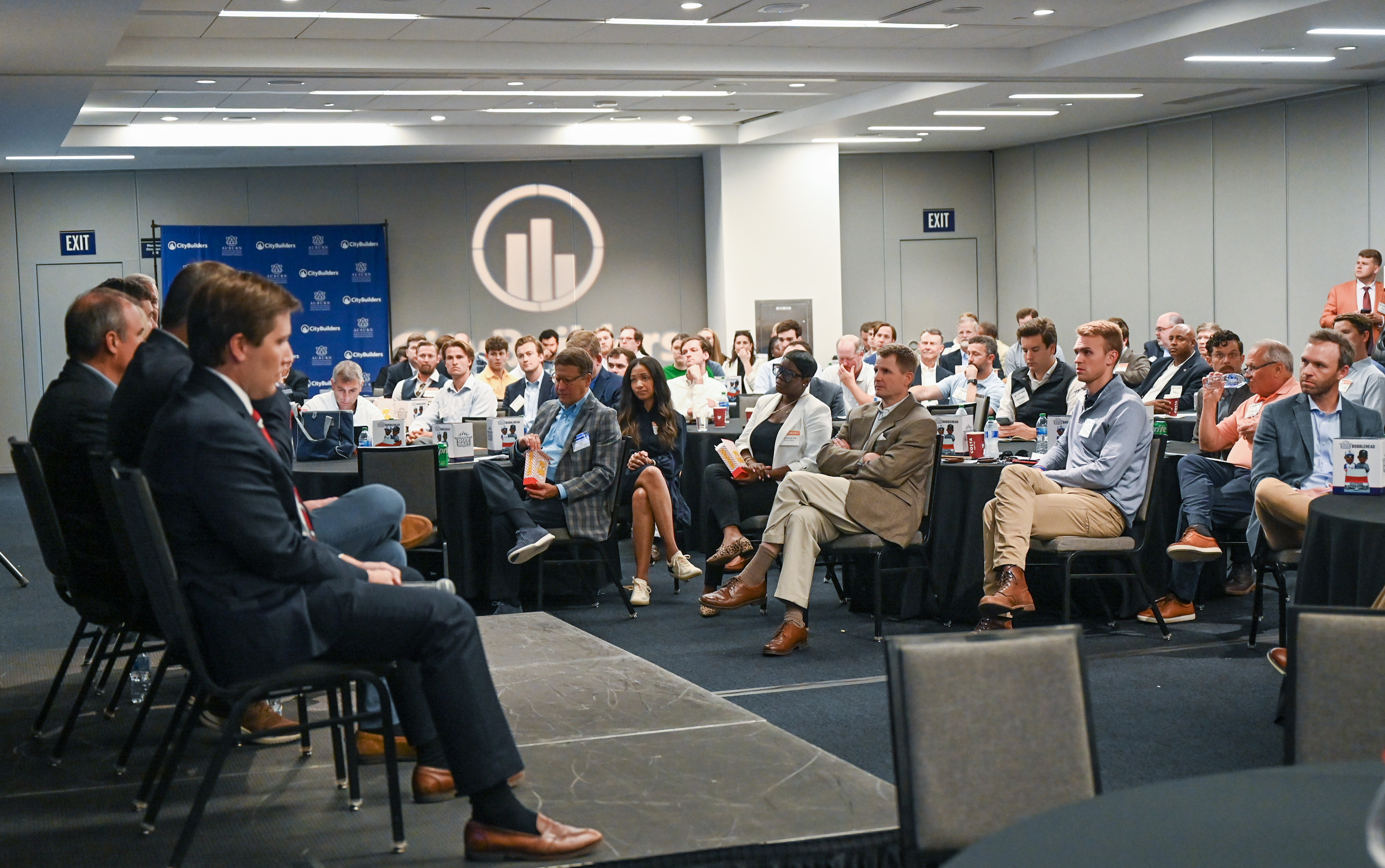 CityBuilders panel sitting in front of audience