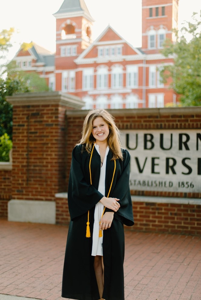 Claire Hendrix cap and gown front of Samford Hall