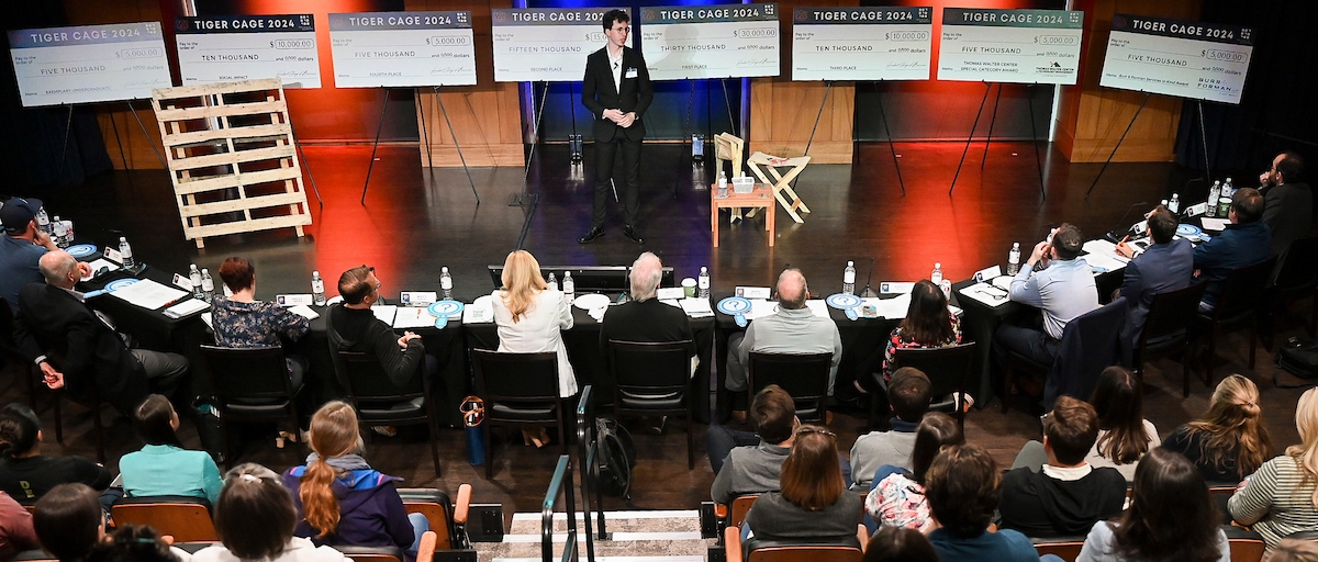 Student pitching to panel of judges
