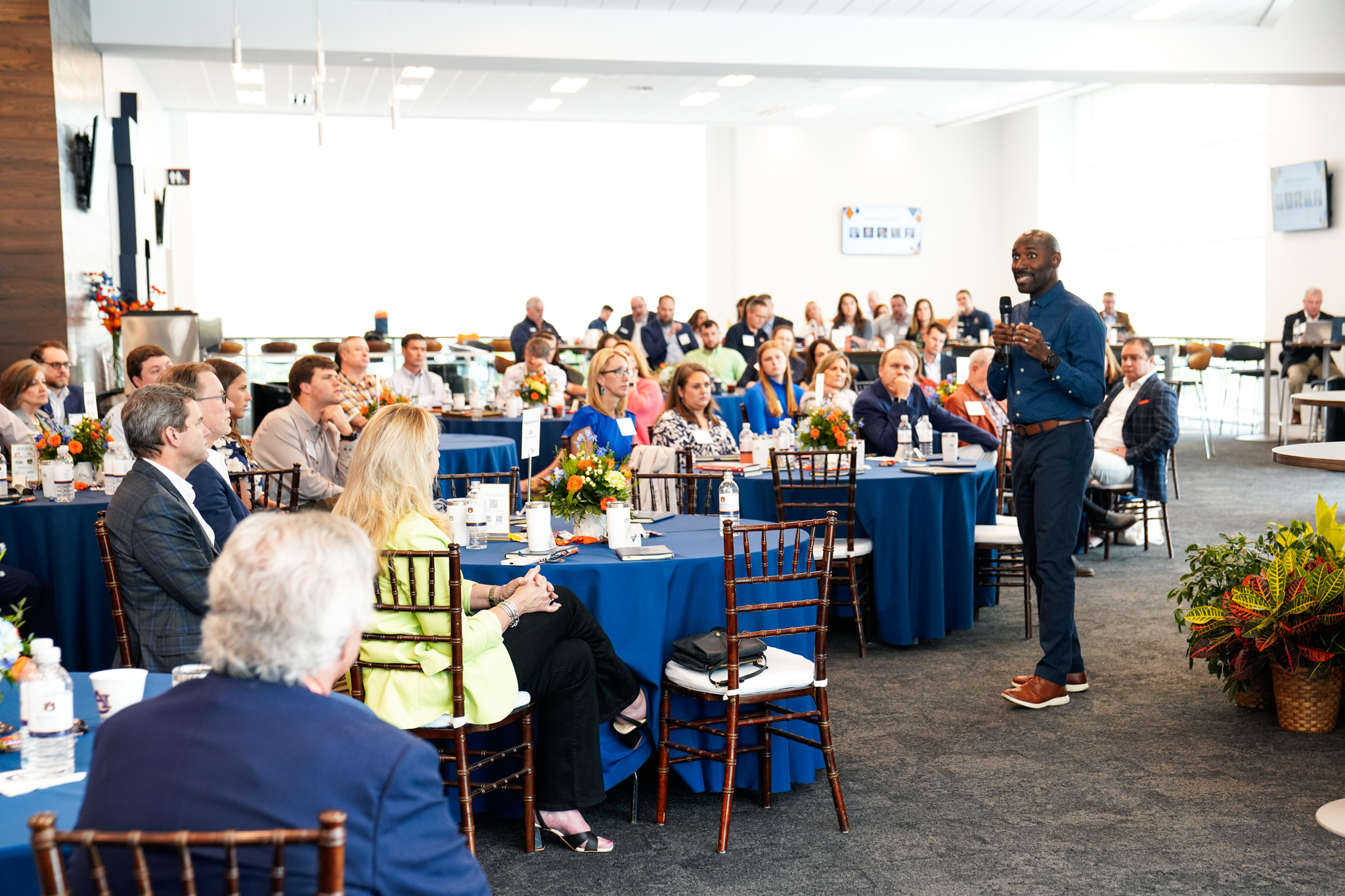 Damion McIntosh Harbert Day Damion McIntosh speaking to seated crowd
