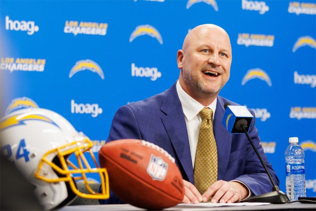 Joe Hortiz sitting at press conference