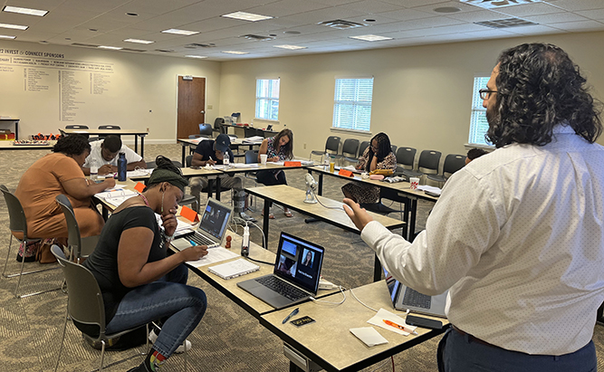 man teaching entrepreneur group