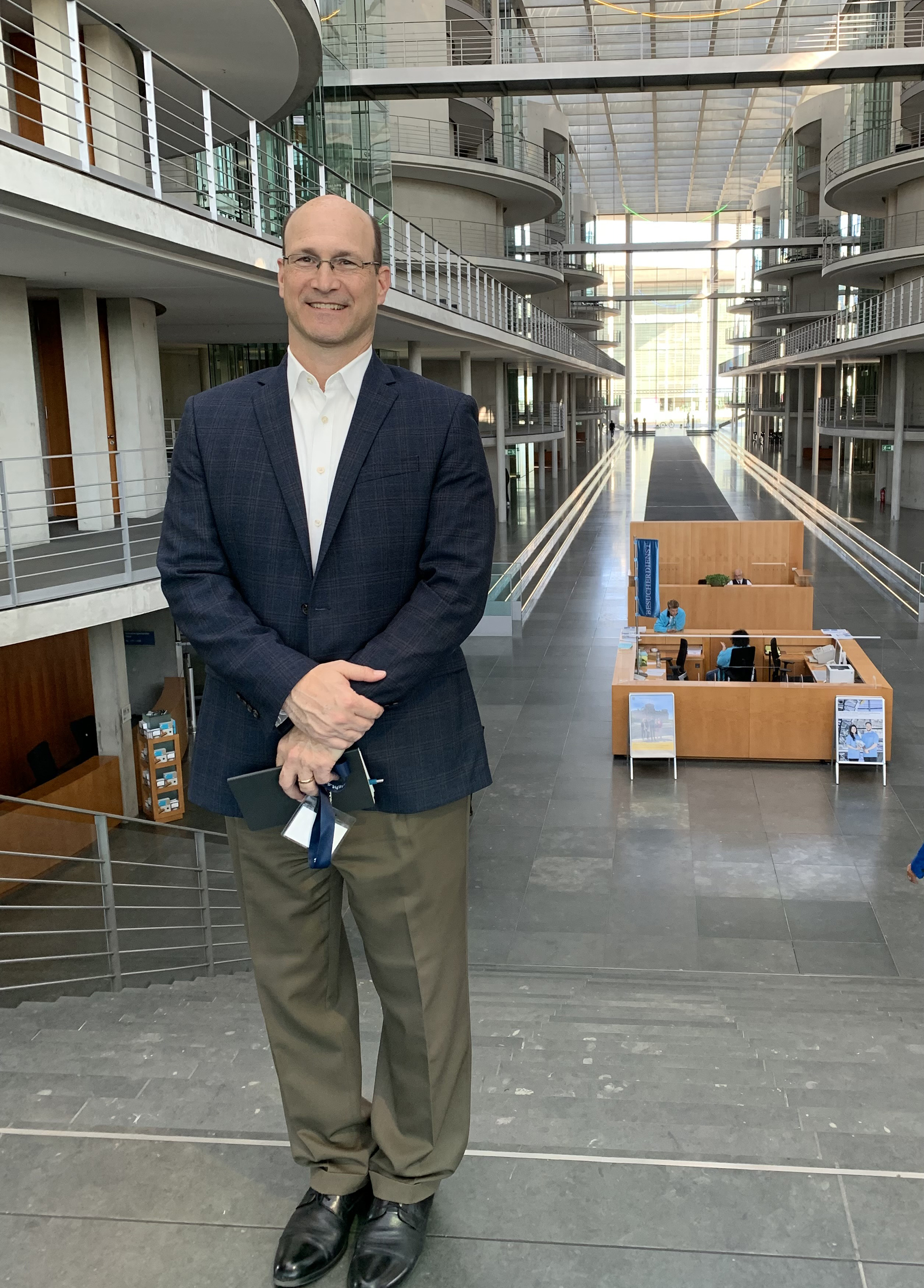 Oprandy standing in German Parliament building