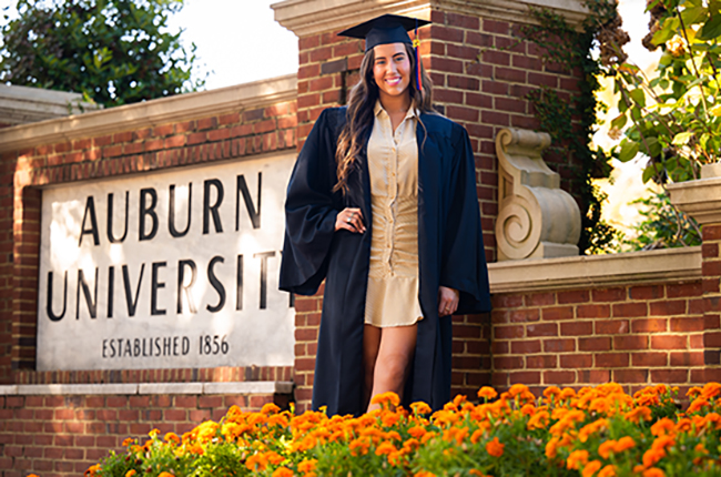 Woman graduate in cap and gown