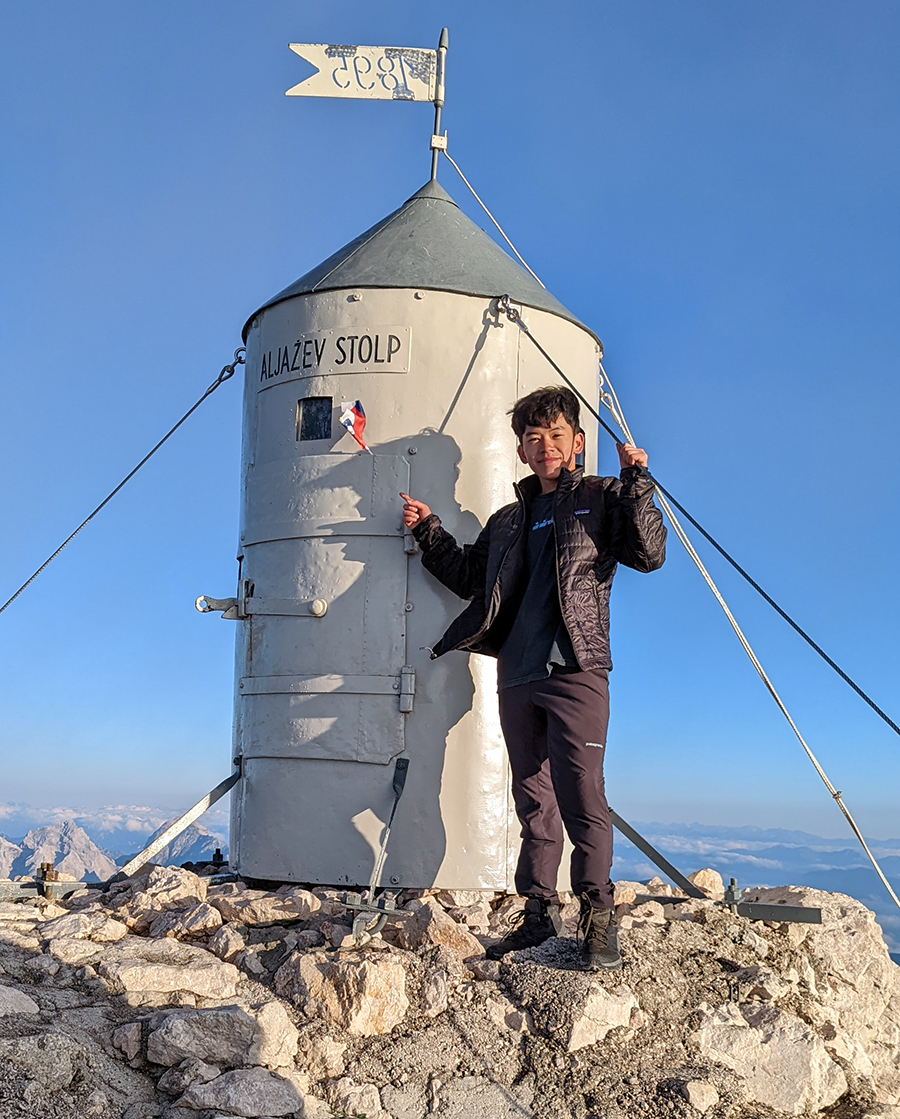 Viet Nguyen Senior Viet Nguyen standing on mountain top
