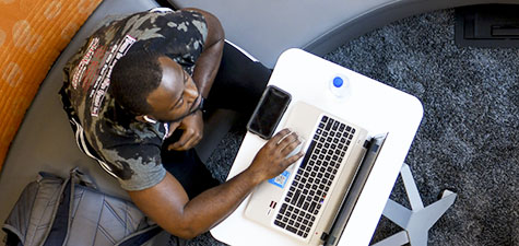 Student on computer in Horton-Hardgrave Hall