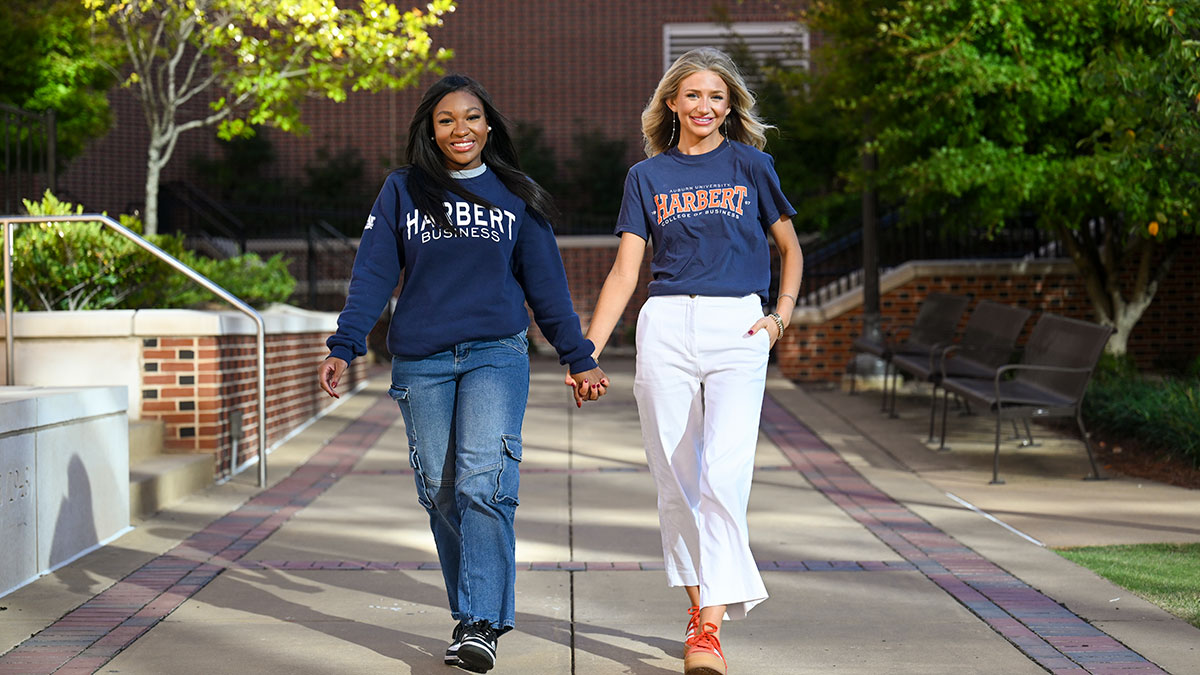 Fall 2025 Harbert Student Creator Program students walking hand in hand