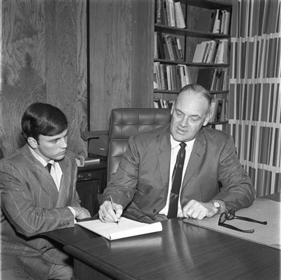 1970 Dean OD Turner visits with student